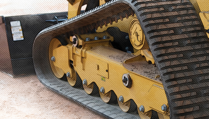 Cat rubber tracks on a piece of Cat heavy machinery